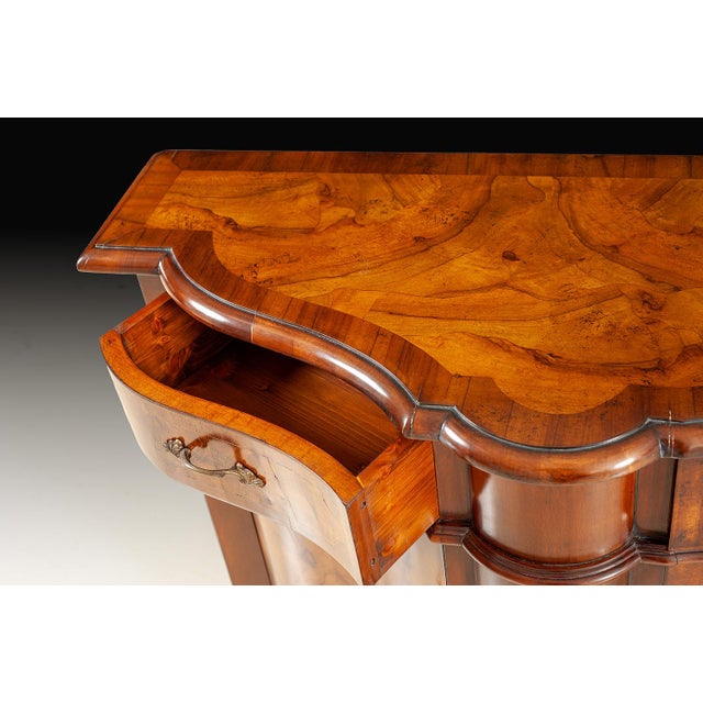 A masterful example of traditional Italian cabinetry, this serpentine sideboard is handcrafted from select solid wood and...