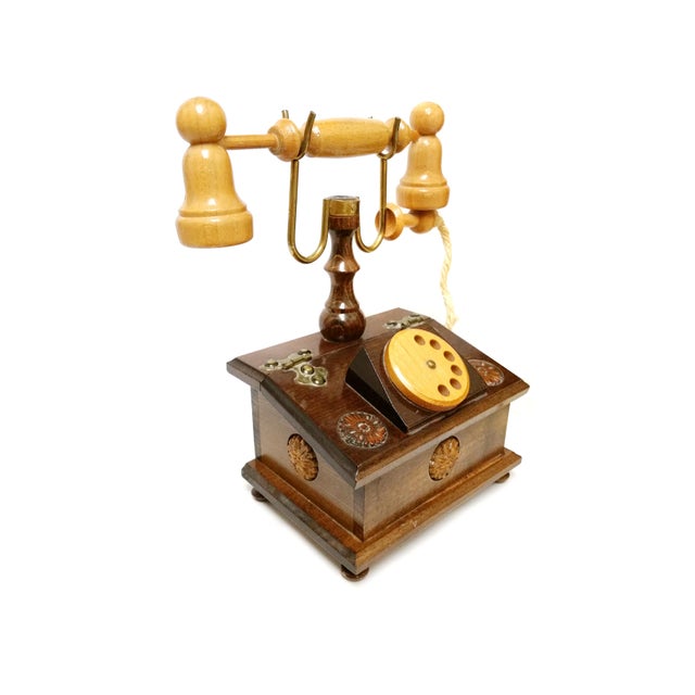 This charming conversation piece expertly blends nostalgic mid-century design with practical hidden storage. Meticulously...