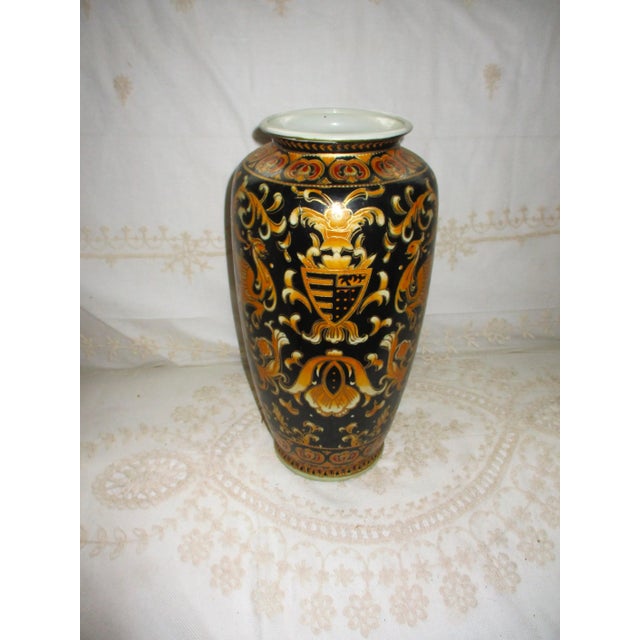 This is a Gorgeous Chinese Porcelain French Style Black Background Vase with a Ornate Gold Enameled Phoenix Coat of Arms...