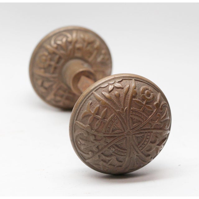 This Vernacular style bronze passage door knobs were made by Lockwood in the 1894 catalog. It is part of the H-20600...