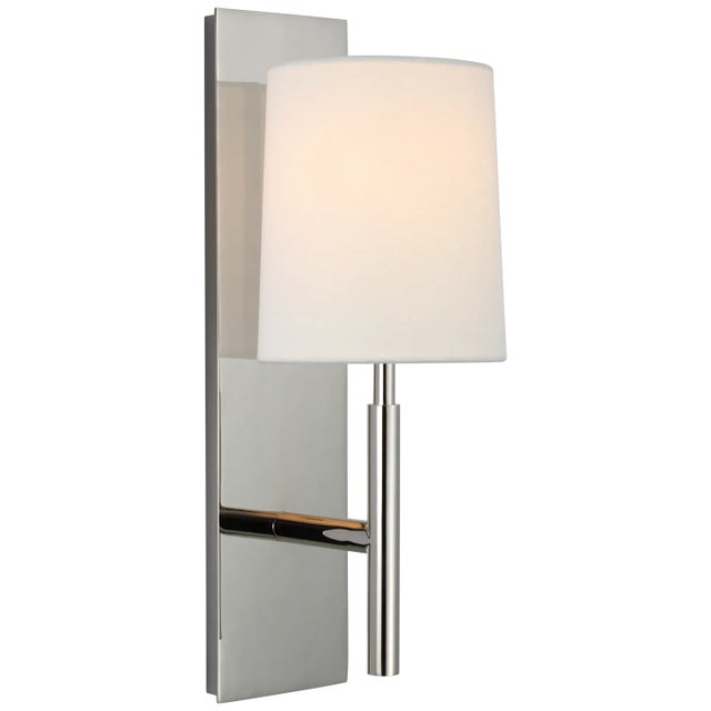 Clarion Medium Sconce in Polished Nickel with Linen Shade Designer: Barbara Barry Height: 16" Extension: 6.75" Backplate:...