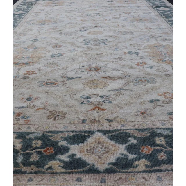 2010s Hand-Knotted Oushak Rug by Keivan Woven Arts, Navy Floral Design 5'7 X 8'8 For Sale - Image 5 of 12