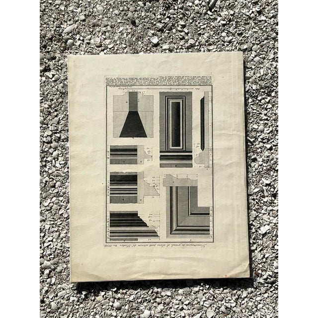 This exquisite vintage architectural print is a masterful celebration of Neoclassical design, capturing the timeless...