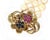 This beautiful estate bracelet features three strands of lustrous 7 mm pearls, finished with a lovely textured floral...