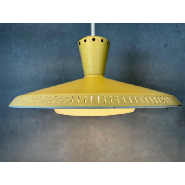 Vintage pendant lamps – philips – louis kalff – model: nb93. Produced in the netherlands in the 1950s. Metal shade with...