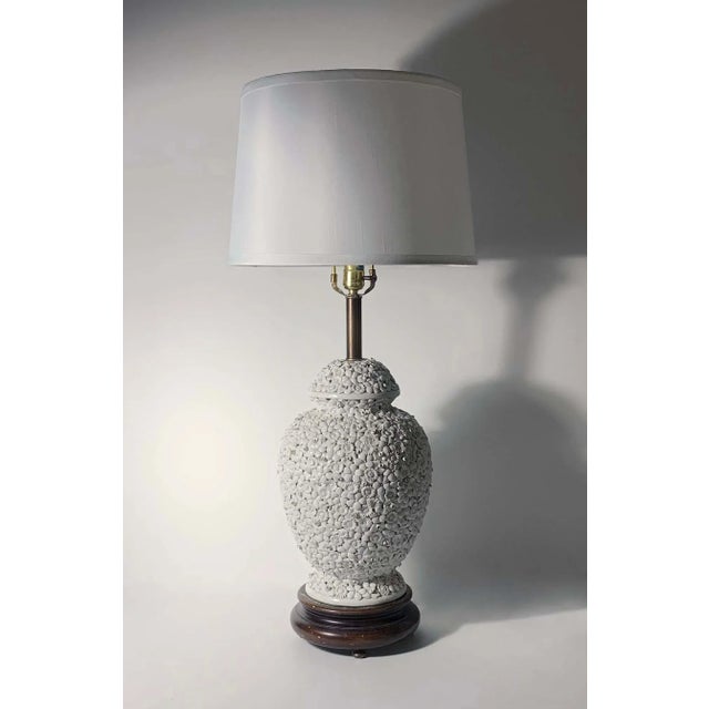 Pair of Vintage Italian Antonio Zen white flower lamps Measures: about 9.5" diameter. height of 24.5 to top of the brass...