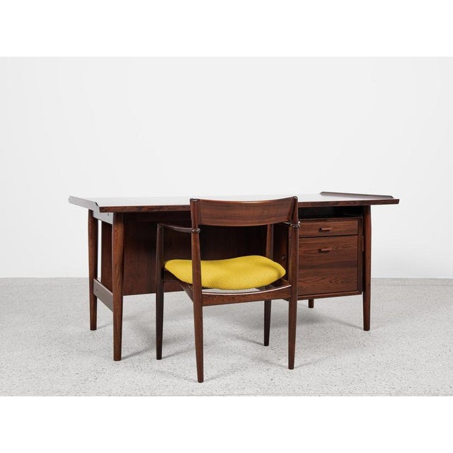 This midcentury desk is designed by Arne Vodder and manufactured by Sibast in Denmark in the 1960s. A true Masterpiece!...