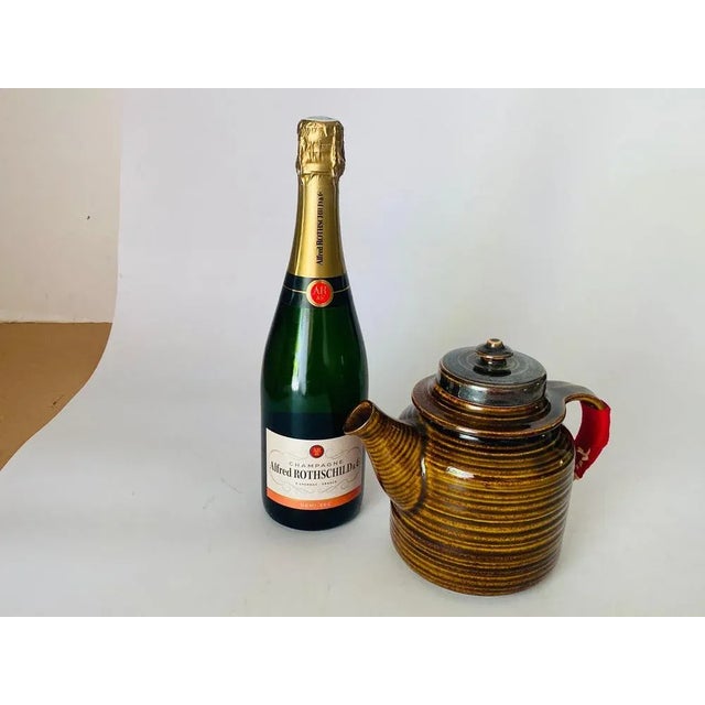 Teapot Arabia Finland teapot, designed Circa 1950, manufactured Circa 1950. Fired and glazed earthenware, brown finish,...