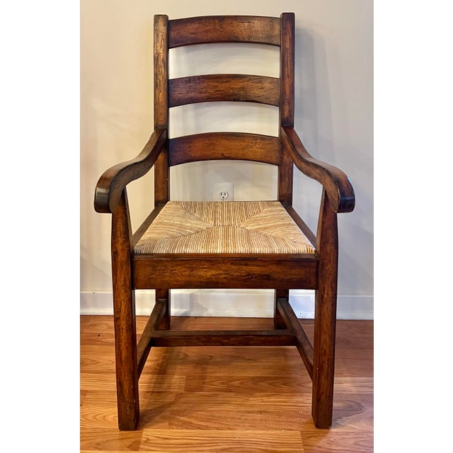 Great pair of rustic Provence Ladderback armchairs with natural rush seats. Solid, sturdy design with rustic European...