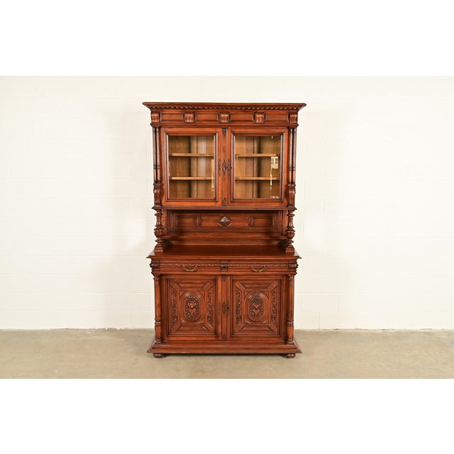 A gorgeous antique French Renaissance sideboard hutch or bar cabinet France, Late 19th Century Carved walnut, with with...