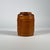 A small turned cigar humidor in the form of a miniature barrel or keg made of a light golden-brown American walnut with a...