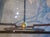 A French 1970s Wrought Iron and Brass Dining Table With Smoked Glass Top For Sale - Image 14 of 18