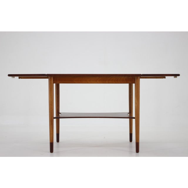 It has been carefully refurbished. Length after unfolding 127cm. This piece is attributed to the mentioned designer/maker....