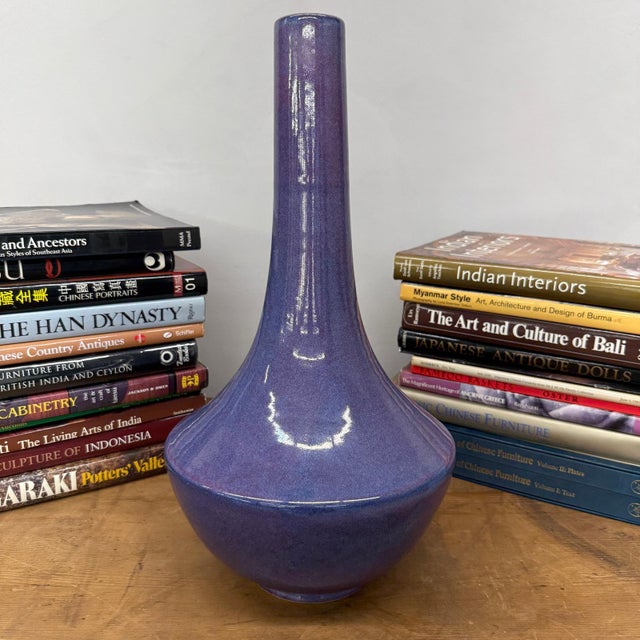 "About This Piece About This Piece Softly radiant, this vase captures the magic of dusk with a glaze that shifts between...