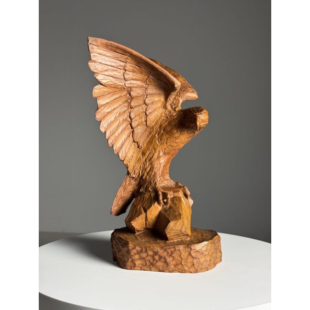 Cool Black Forest statue of Eagle, standing on a rock. Completely carved by hand. Early 20th century. Signed. Condition is...