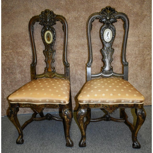 Pair of (1910s) Antique Side Chairs have a Venetian Style. Made of Wood. Carved Walnut with a Hand Painted Distressed...