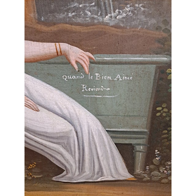 Absolutely beautiful example of an original French trumeau mirror with painting of what appears to depict a scene from the...