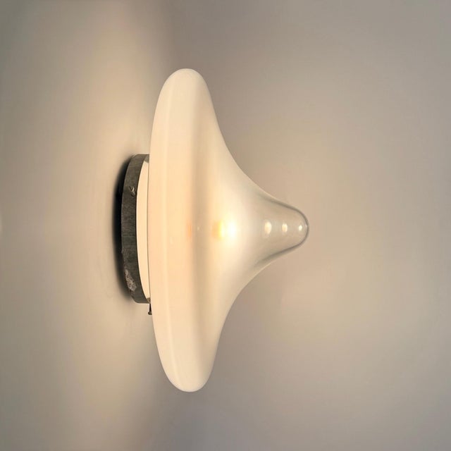 This large opaline glass flush mount was produced in Italy during the 1970s and stands out for its substantial...