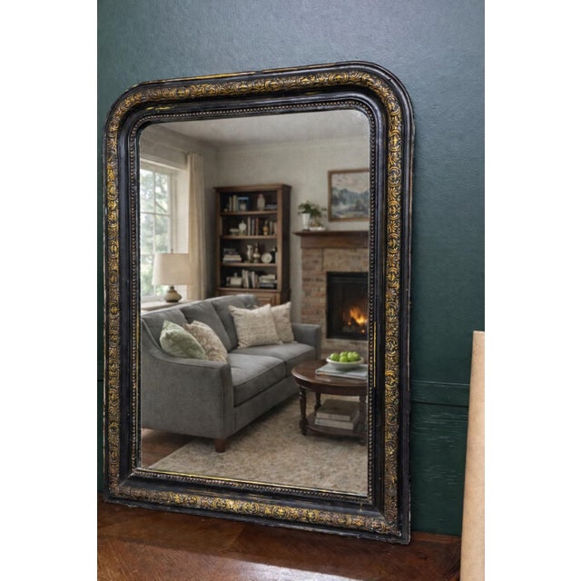 Beautiful and rare 19th Century French Louis Phillipe Style black and gold mirror with beautiful carving, beaded detail....