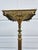 A classic Victorian style brass, cast iron and marble top pedestal plant stand or display piece. This piece has a heavy...