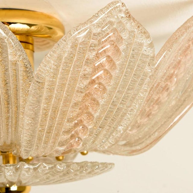 Beautiful and elegant hand blown glass chandelier in the style of Barovier. Made around the 1960s. This light fixture...