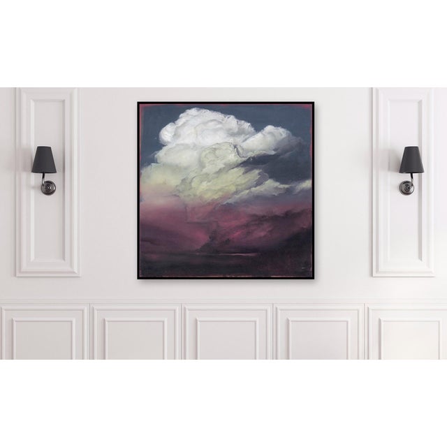 The artwork depicts a dramatic cloud formation illuminated by an ethereal glow, blending shades of deep purple and soft...