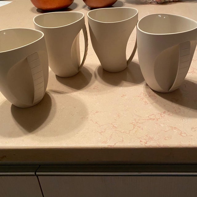 A rare set of 4 vintage handmade ceramic stoneware mugs, sculptural, from Citywoods — brand new/never used, perfect for...