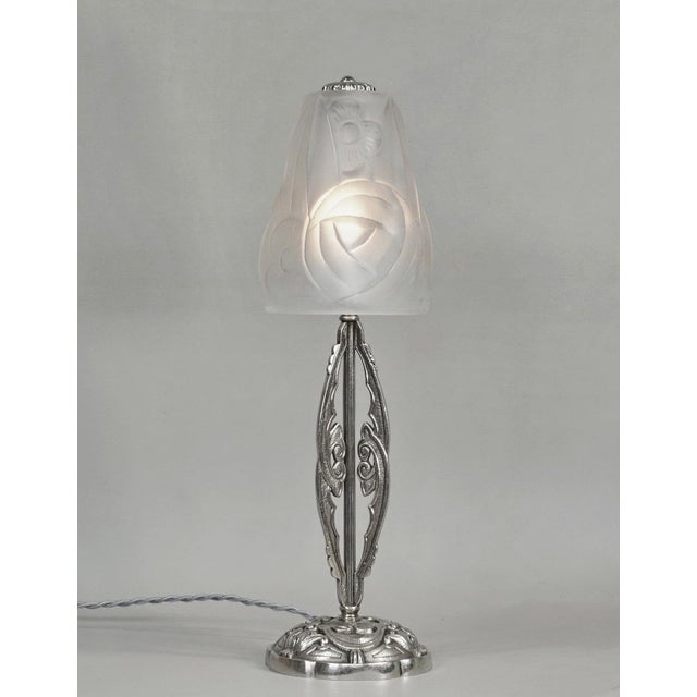 Degué A beautiful French 1925-1935 nickel on solid brass art deco lamp. A nicely shaped art deco base holds a shade by...