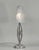Degué A beautiful French 1925-1935 nickel on solid brass art deco lamp. A nicely shaped art deco base holds a shade by...