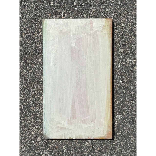 A subtle study in restraint and texture, this small white canvas painting invites close inspection with its delicate...