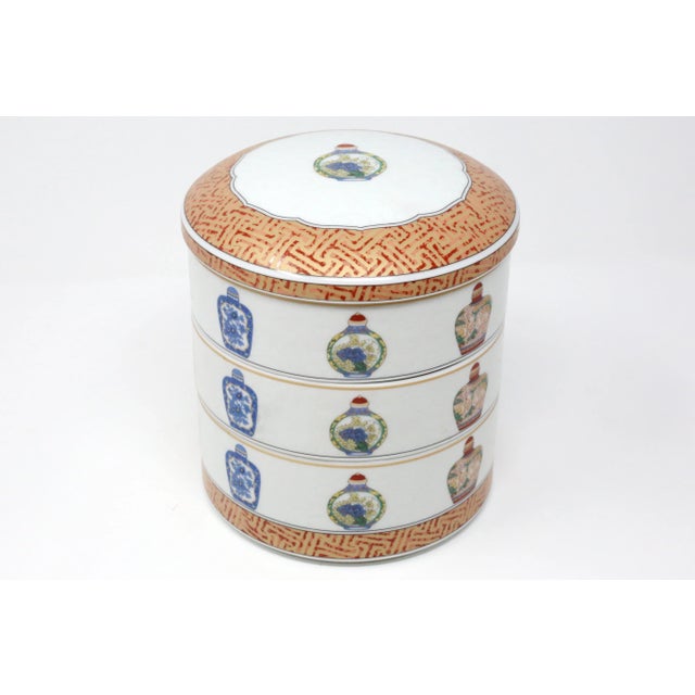 A set of three large stacking bowls with lid, in the "China Seas" pattern by Maebata. Good vintage condition; no chips or...