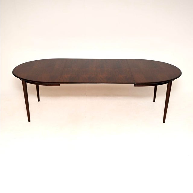A stylish and extremely well made vintage Danish vintage extending dining table. This was made in Denmark, it dates from...