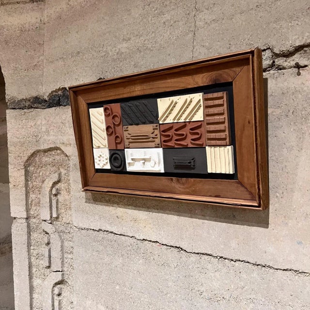 For your consideration, a vintage 1980s modern pottery tile wall art featuring an assembly of textured, geometric ceramic...