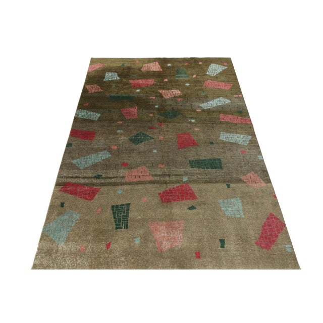 Hand-knotted in wool, this 6x10 vintage Turkish Deco rug piece joins Rug & Kilim’s Mid-Century Pasha collection. This...