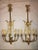 Group of six Louis XVI style harp back bronze wall sconce. This fine pair reminiscent of the Hollywood Regency era are all...
