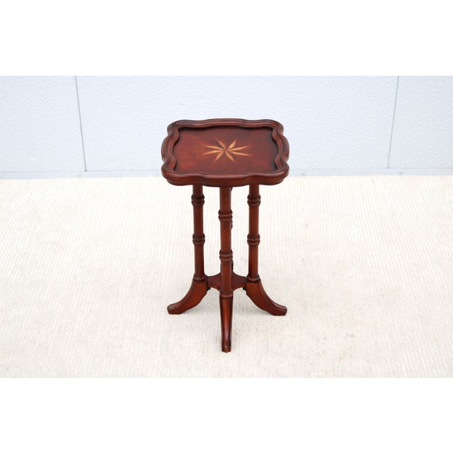 Fabulous traditional Colonial Revival-style small accent table in plantation cherry finish and solid rubberwood with light...
