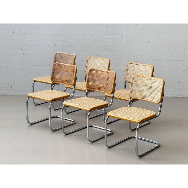 These iconic cantilever chairs, model s 32 v by thonet, exemplify the timeless fusion of bauhaus aesthetics and industrial...
