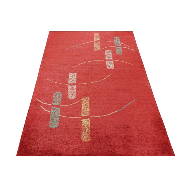 Hand-knotted in wool circa 1960-1970, this 4x6 vintage rug is an exciting new piece in Rug & Kilim’s Mid-Century Pasha...