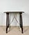 A charming Spanish side table crafted from solid wood, reflecting the enduring appeal of traditional Spanish...