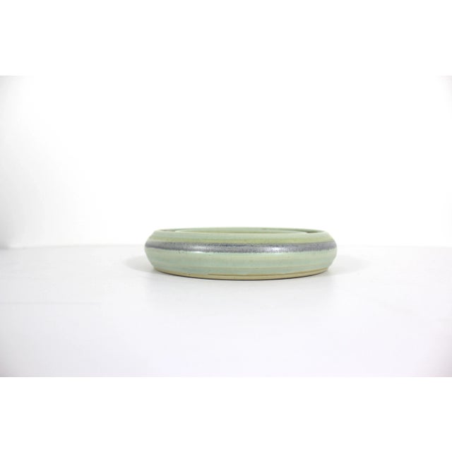 Width: 6.5 inches Height: 1.25 inches Vintage handmade ceramic pansy ring or ikebana vase. Makes a beautiful centrepiece....