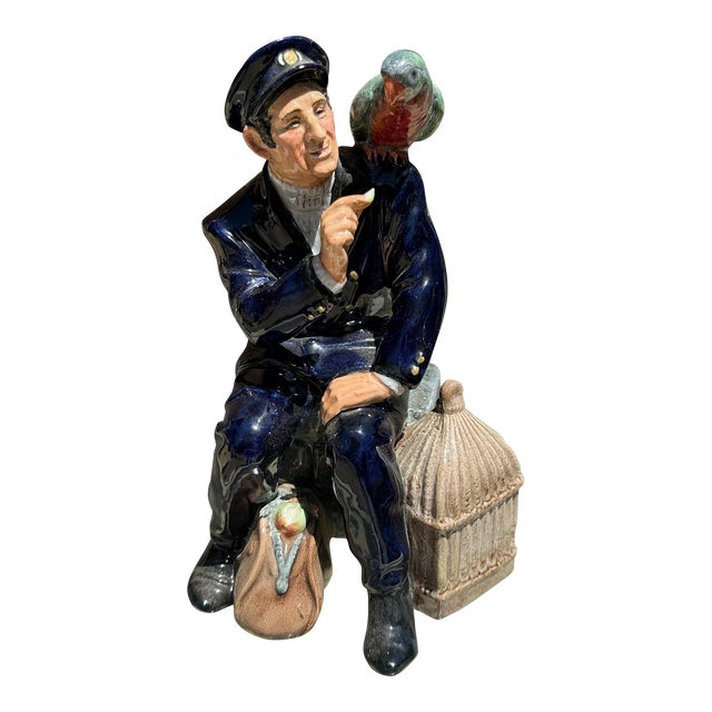 1970s English Ceramic Painted Sitting Man and Bird Sculpture For Sale