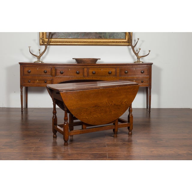 English Oval Oak Drop-Leaf Table with Single Drawer and Baluster Legs For Sale In Atlanta - Image 6 of 11