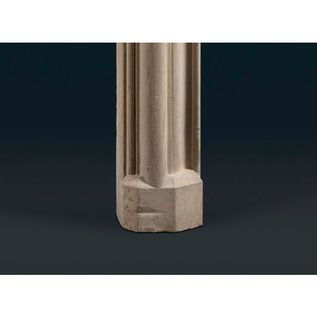 An antique Victorian Bath Stone bolection fireplace surround, featuring a deep and complex ogee mould frame raised on...