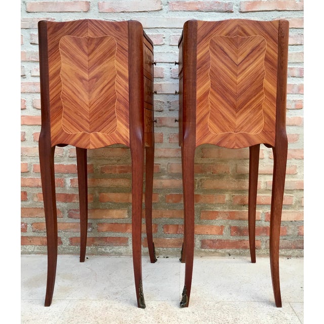 This elegant pair of bedside tables is crafted in the French Louis XV style and dates from the early 20th century. Each...