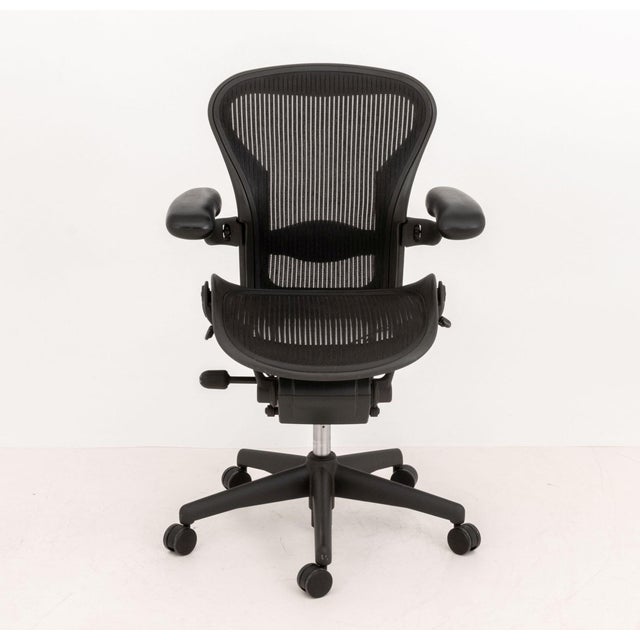 Herman Miller "Aeron" Office Chair, with swivel seat, adjustable seat, back, and arms on five star base on casters, marked...