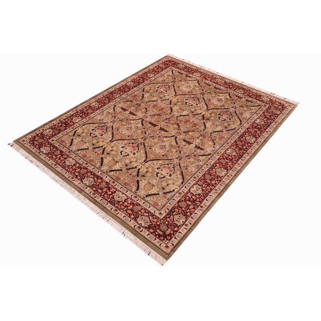 Designed with mesmerizing intricacy and gorgeous color palette, this hand-knotted masterpiece demonstrates the beauty and...