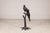This vintage bronze parrot sculpture captures the commanding presence and intelligence of one of nature’s most...