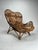 This pair of armchairs represents an iconic testament to postwar Italian design, designed by renowned architect and...