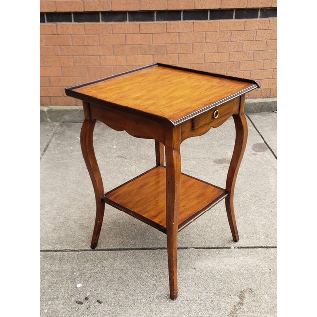 Theodore Alexander Chateaux Du Vallois collection single drawer Tier Yew wood Side Table. Measures 20" in width, 20" in...