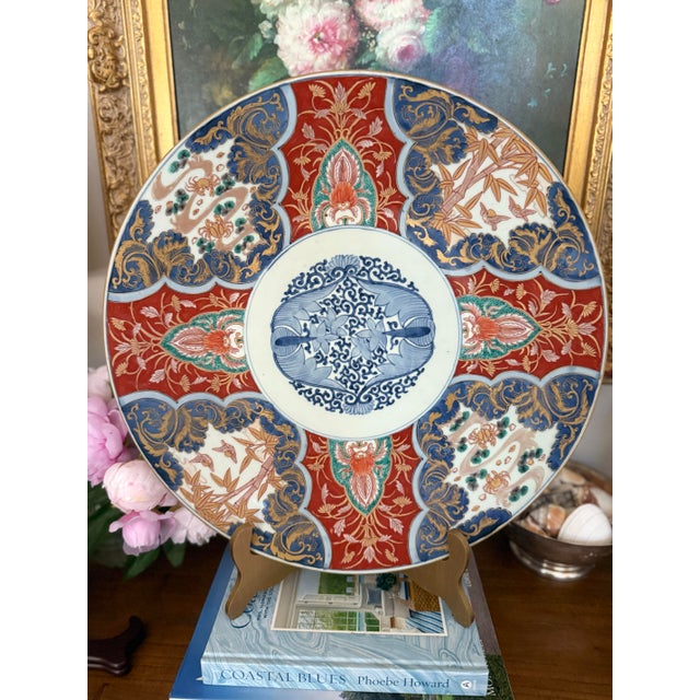 A stunning large antique Japanese Imari charger dating to the Meiji period (late 19th century). Hand painted in the...